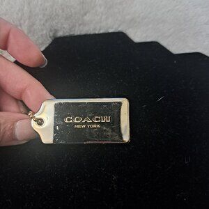 coach tag